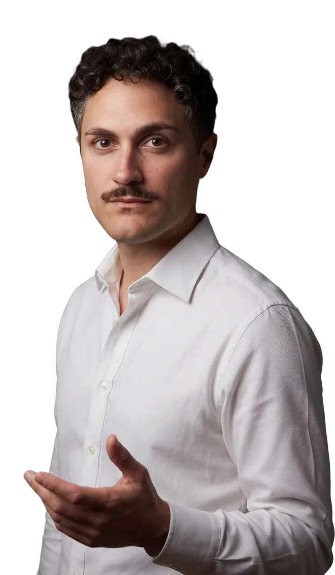 Davide Scalera in camicia bianca, girato di tre quarti, con la mano aperta in un gesto di invito